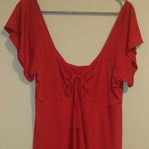 2 blouses 1 red and 1 cream